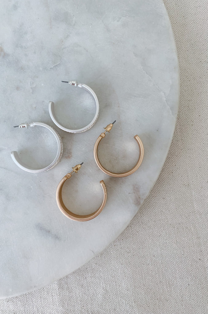 The 1" Aztec Stamped Hoops have a matte finish with a unique design. This style is inspired by the popular western trend we are seeing. They will look cute with any outfit and are comfortable too. 