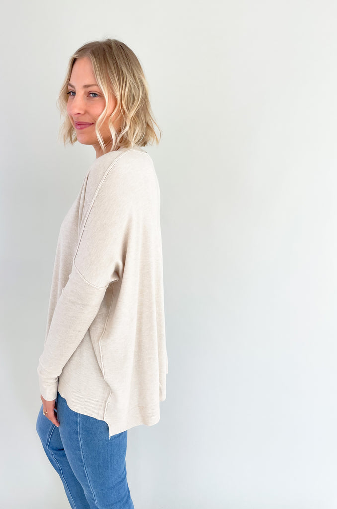 The Always Center Seam Square Hem Sweater is a must-have for the upcoming season. The fabric is extremely soft and lux, giving a chic look. Ivory is a classic color too, so you know you will wear it again and again. You could easily wear this cozy style on its own, or layered under jackets. Always Center Seam Square Hem Cream Cashmere Blend Sweater