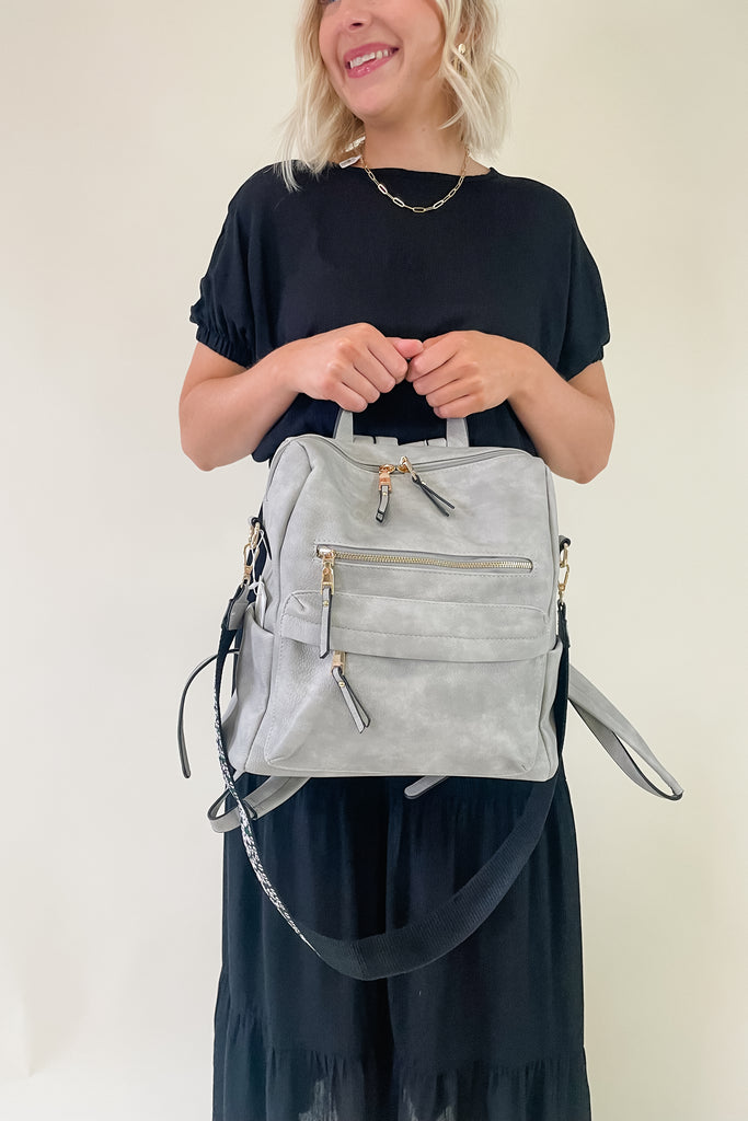 The Amelia Guitar Strap Back Pack is perfect for on-the-go! With multiple interior and exterior pockets, this bag is large enough to fit all the essentials, and more. The faux leather feels really soft and is great quality. The inside is quilted too. Each bag has the traditional faux leather adjustable straps, but also comes with an exclusive guitar strap.