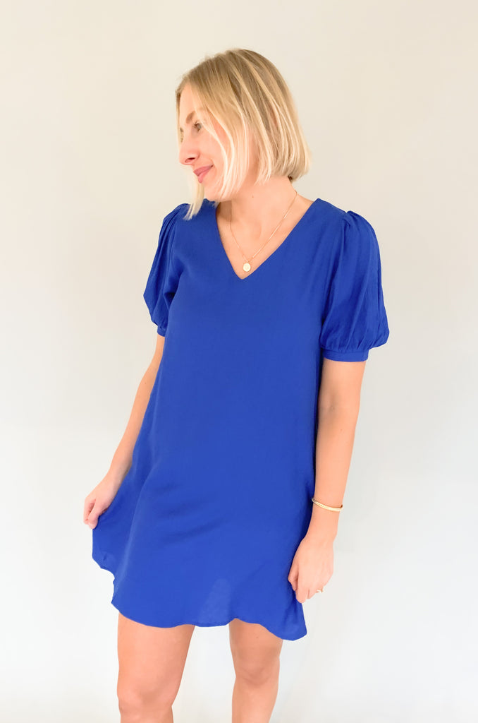 We love a pretty spring dress! The Anna Short Sleeve V Neck Dress comes in three amazing colors. Pink and royal make a statement, while black is just a classic you can never go wrong with. We are loving the silhouette. It's feminine, especially with the puff sleeves. To contrast, the body is flowy and it has side pockets. A dress like this that's not only so chic, but also comfortable is a major win!