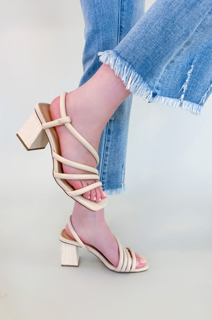 The Ashley Strappy Block Heel Sandal is a classic style for spring and summer. It will be your go-to sandal for a night out, special events, weddings, and more. Plus, the neutral color matches so many looks. The lower heel and vegan leather straps make it very comfortable too. 