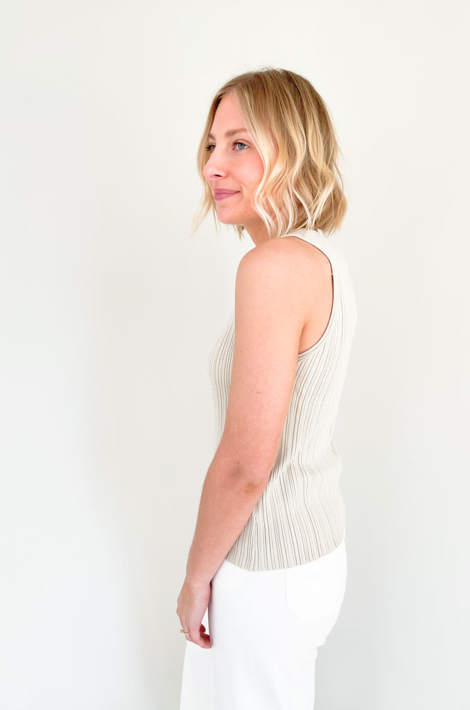 Upgrade your wardrobe with our Becca Basic Knit Ribbed Tank- a must-have staple piece for any fashion-forward individual. Available in two classic colors - off white and beige/green - this tank is perfect for any occasion.