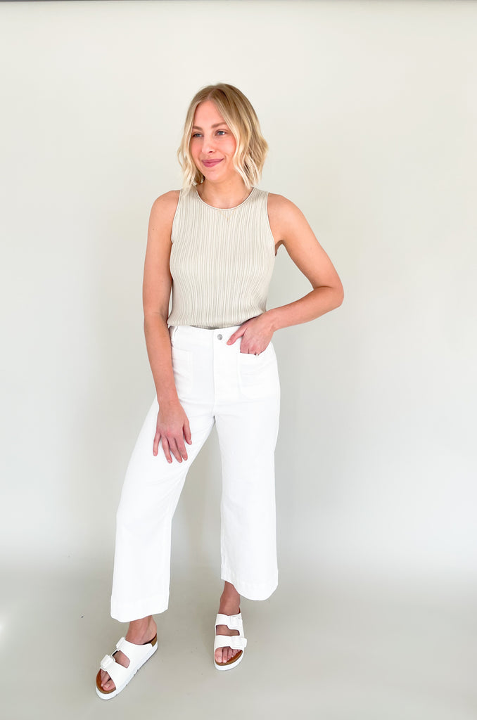 Upgrade your wardrobe with our Becca Basic Knit Ribbed Tank- a must-have staple piece for any fashion-forward individual. Available in two classic colors - off white and beige/green - this tank is perfect for any occasion.