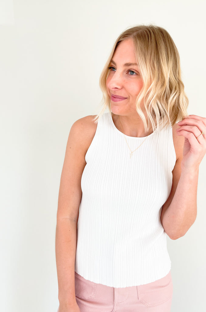 Upgrade your wardrobe with our Becca Basic Knit Ribbed Tank- a must-have staple piece for any fashion-forward individual. Available in two classic colors - off white and beige/green - this tank is perfect for any occasion.