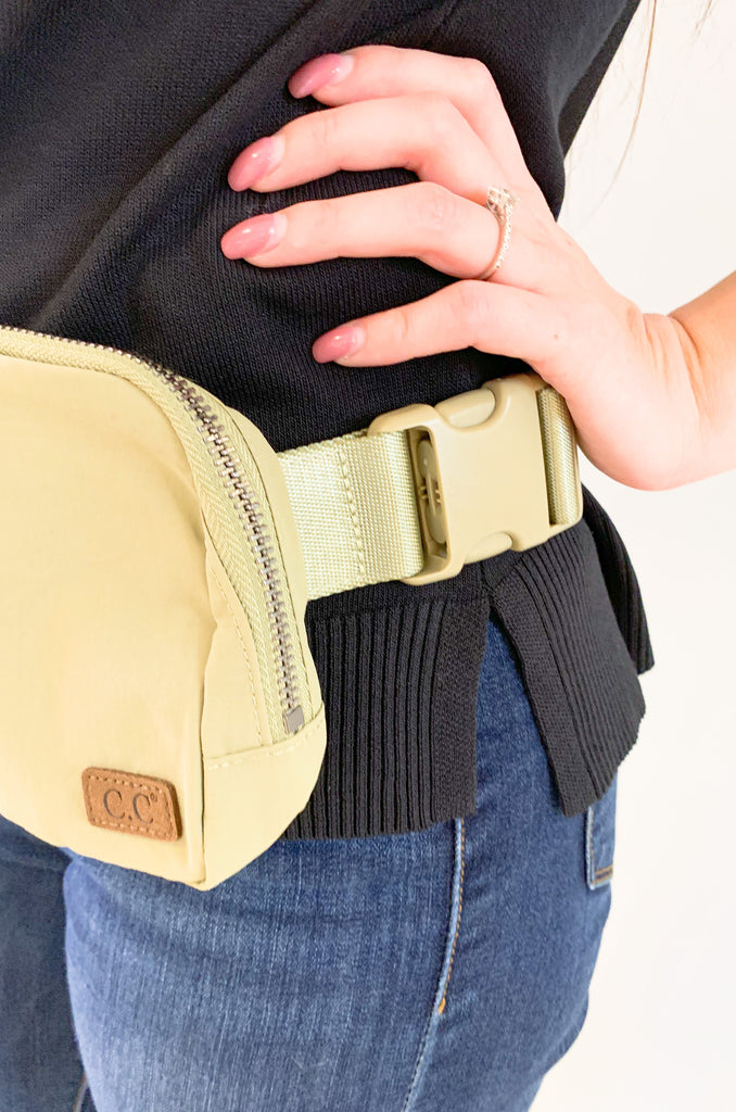 The C.C  Waterproof Mini Belt Bags are made for women on the go! You can wear them as a traditional "fanny pack" belt bag, or try the sling bag trend. Either way, this mini accessory is hands free and effortless. It has multiple inner storage compartments with an extra exterior zipper pocket on the bag. On the front, there is a small brown faux leather cc logo. 