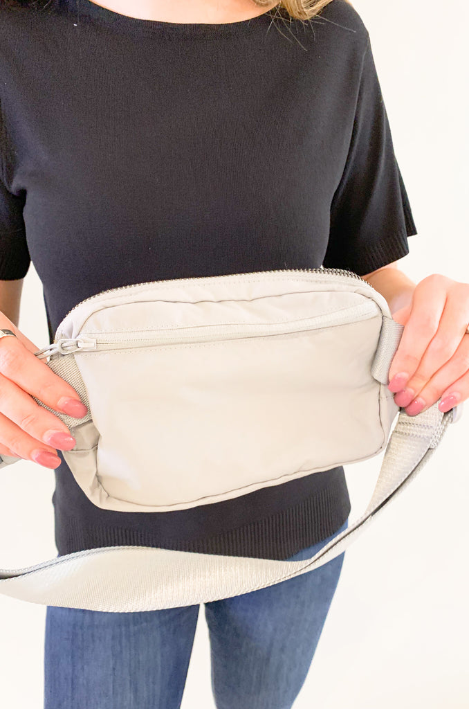 The C.C  Waterproof Mini Belt Bags are made for women on the go! You can wear them as a traditional "fanny pack" belt bag, or try the sling bag trend. Either way, this mini accessory is hands free and effortless. It has multiple inner storage compartments with an extra exterior zipper pocket on the bag. On the front, there is a small brown faux leather cc logo. 