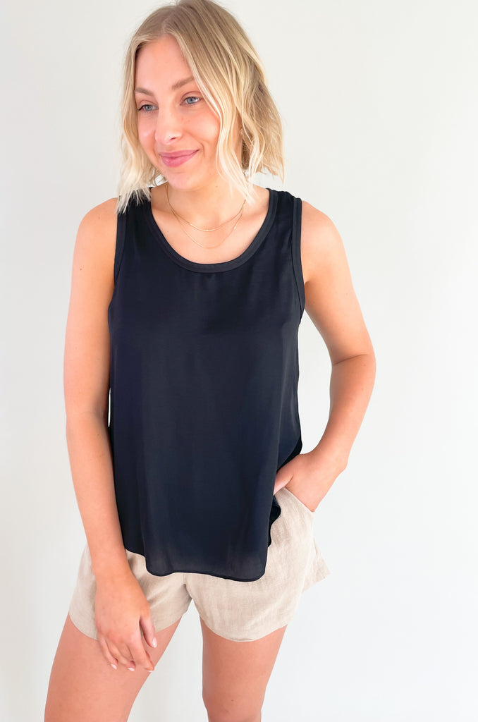 Elevated tanks make the look! Whether you are wearing the Camryn Casual Round Neck Tank on its own, or layering it under your favorite jacket or cardigan, this style is a go to! It's chic, elevated, and comes in three classic colors sage, black, and ivory. The silky look is a nice touch to every outfit. 