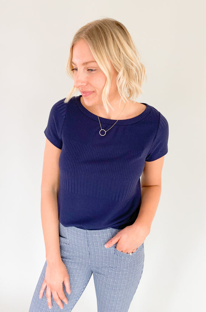 The Liverpool Cap Sleeve Boat Neck Baby Ribbed Tee is an Elevated basic, perfect for spring. The fabric is super comfortable and lightweight, plus the ribbed details are very flattering. You can easily dress this style up or down for any occasion. We embraced the coastal chic look by pairing it with our new Liverpool Stella Kick Flare 25" Pants and Frayed Zip Jacket with 3/4 Length Sleeves.