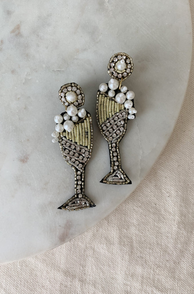 Celebrate in style with these fun Champagne Seed Bead Earrings! These are perfect for bridal showers, anniversaries, special events, and the holidays. They are an all year round statement piece for when you want to have a little fun. 