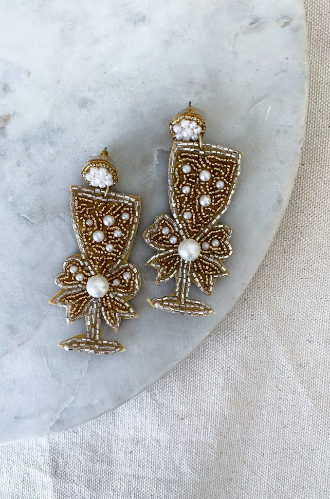 Celebrate in style with these fun Champagne Seed Bead Earrings! These are perfect for bridal showers, anniversaries, special events, and the holidays. They are an all year round statement piece for when you want to have a little fun. 
