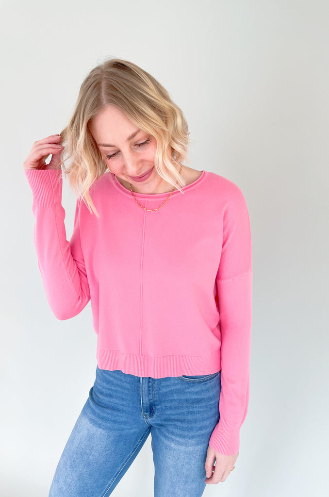 The Claire Round neck Pullover Sweater is an all-time Katsch favorite! With its dreamy fabric and flattering silhouette, there's no wonder we bring it back every spring. This style is slightly shorter, hitting at the waist. It pairs perfectly with trendy high rise jeans. Choose between several spring colors to complete your look. 