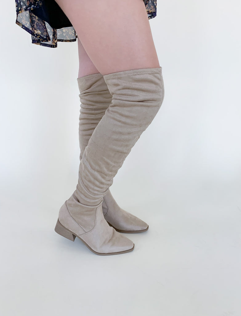The Deena Over the Knee Faux Suede Boot is right on trend this season! Tall boots instantly elevate your look, plus these are ver comfortable. They have the softest vegan suede material, a side zipper, and a slight heel. Pair these boots with your favorite dress, skirt, or over jeans for an effortless look! 