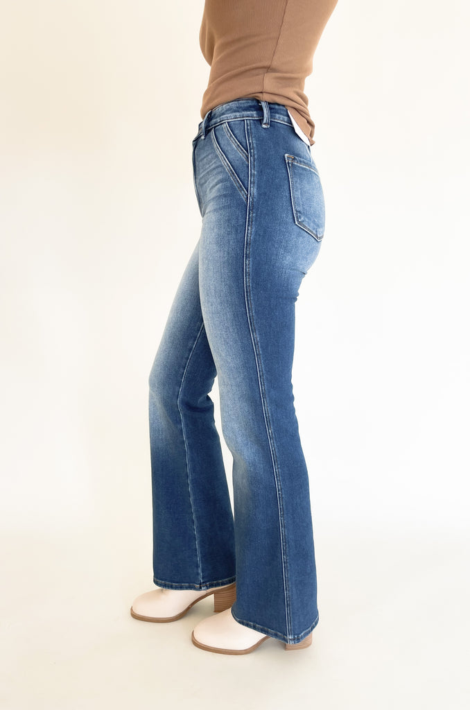 The Dionne Medium Wash High Rise Jeans are so on trend, comfortable, and look amazing on several body types. We know wide leg jeans are a tall girl's go-to, but they look great with so many body types! Pro tip: You can easily trim this style to fit you perfectly! This style is worth it, especially with the unique double pocket look and faded wash. It's elevated and effortlessly cool. 