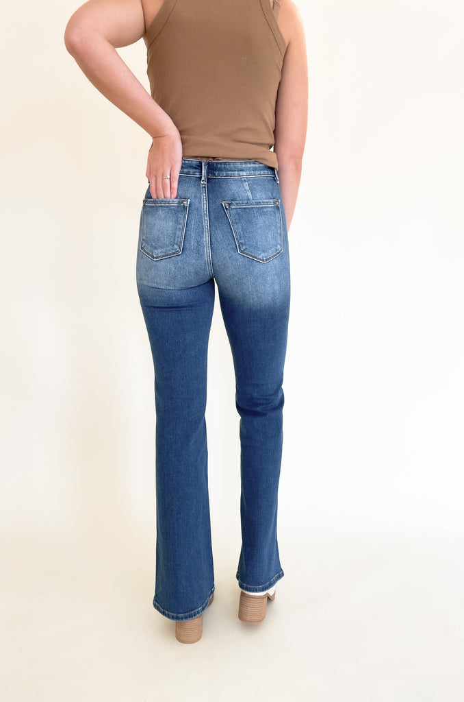 The Dionne Medium Wash High Rise Jeans are so on trend, comfortable, and look amazing on several body types. We know wide leg jeans are a tall girl's go-to, but they look great with so many body types! Pro tip: You can easily trim this style to fit you perfectly! This style is worth it, especially with the unique double pocket look and faded wash. It's elevated and effortlessly cool. 