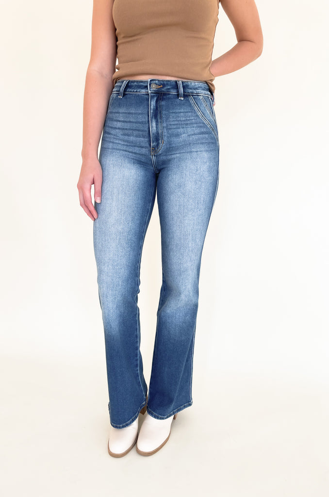 The Dionne Medium Wash High Rise Jeans are so on trend, comfortable, and look amazing on several body types. We know wide leg jeans are a tall girl's go-to, but they look great with so many body types! Pro tip: You can easily trim this style to fit you perfectly! This style is worth it, especially with the unique double pocket look and faded wash. It's elevated and effortlessly cool. 