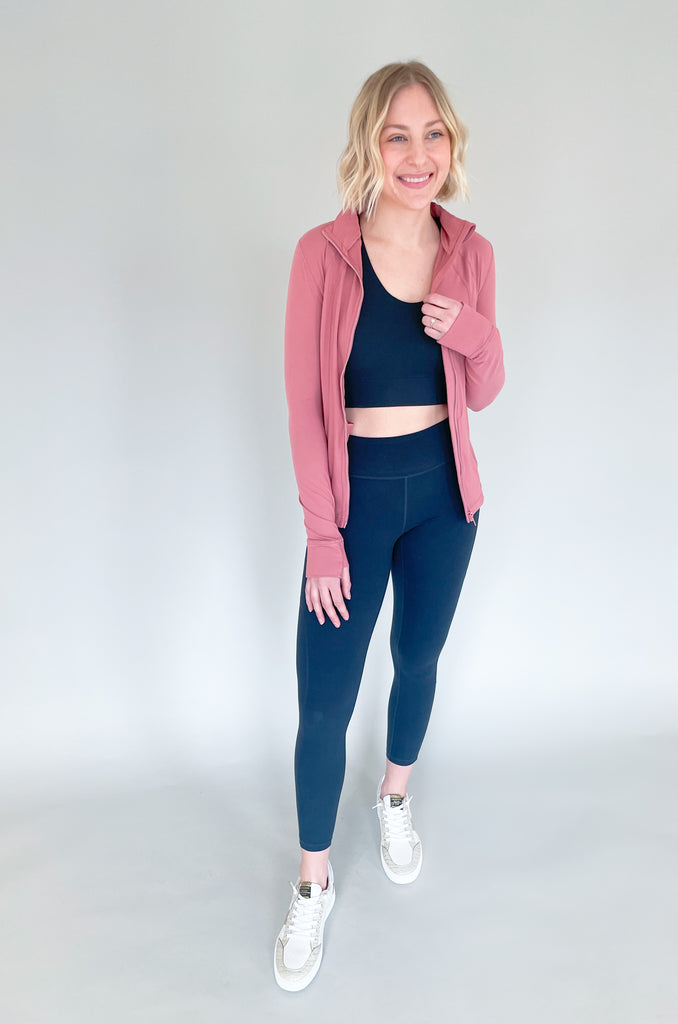 The Direct Full Zip Long Sleeve Jacket is cute and sporty, perfect for busy days on-the-go! You can wear it to the gym, or wear it to the store, either way it's an easy add-on for spring. The fabric is buttery soft and lightweight. Keep one of these in your bag or car to just throw on and go! 