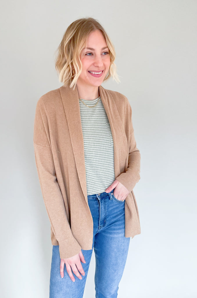 The Donna Draped Long Sleeve Cardigan is so soft and comes in two gorgeous colors.  These cardigans can be worn all year, so you will get a lot of wear out of them. Layering pieces are great for chillier days and make an outfit look more polished. They are also great for the office! If you love all things cute and cozy, this style is for you. 