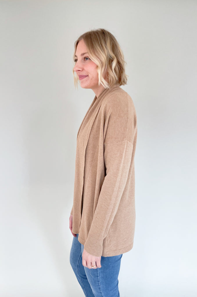 The Donna Draped Long Sleeve Cardigan is so soft and comes in two gorgeous colors.  These cardigans can be worn all year, so you will get a lot of wear out of them. Layering pieces are great for chillier days and make an outfit look more polished. They are also great for the office! If you love all things cute and cozy, this style is for you. 