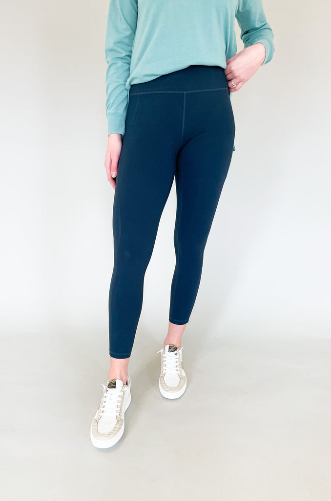 The Drill 2.0 Full Length High Rise Legging is the updated version of our all time favorite legging. This style is made from the same buttery soft material and comfortable stretch, just now available in new colors! On each side, there are pockets that could fit your phone or a small wallet. 