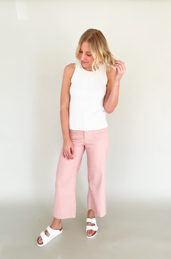 Upgrade your wardrobe with our Becca Basic Knit Ribbed Tank- a must-have staple piece for any fashion-forward individual. Available in two classic colors - off white and beige/green - this tank is perfect for any occasion.