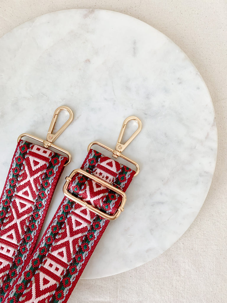 Make your favorite bag pop with these amazing Fabric Guitar Straps! They are so pretty and a very trendy. Each one is unique and durable. You can detach it an add it to any bag. At each end, there are gold tone metal clasps. 