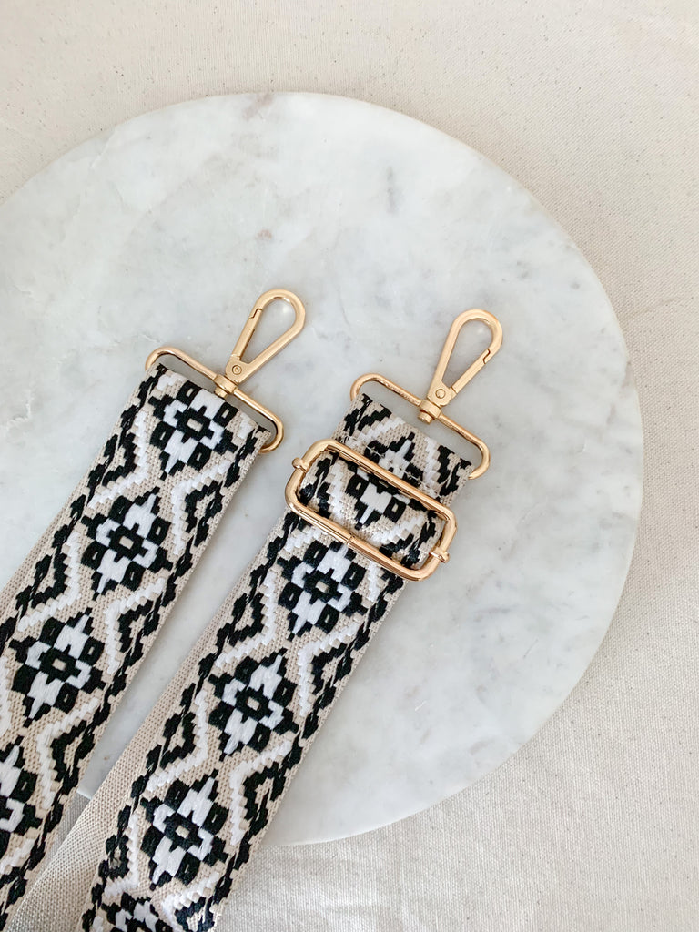 Make your favorite bag pop with these amazing Fabric Guitar Straps! They are so pretty and a very trendy. Each one is unique and durable. You can detach it an add it to any bag. At each end, there are gold tone metal clasps. 
