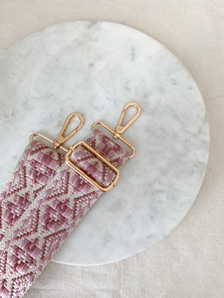 Make your favorite bag pop with these amazing Fabric Guitar Straps! They are so pretty and a very trendy. Each one is unique and durable. You can detach it an add it to any bag. At each end, there are gold tone metal clasps. 