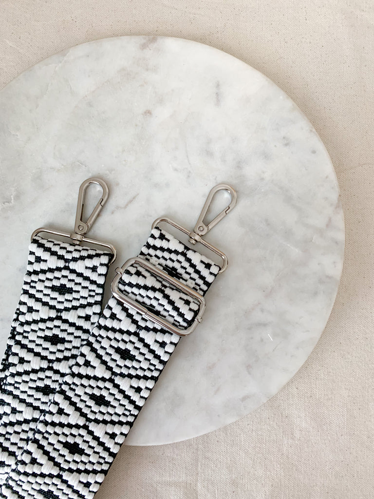 Make your favorite bag pop with these amazing Fabric Guitar Straps! They are so pretty and a very trendy. Each one is unique and durable. You can detach it an add it to any bag. At each end, there are gold tone metal clasps. 