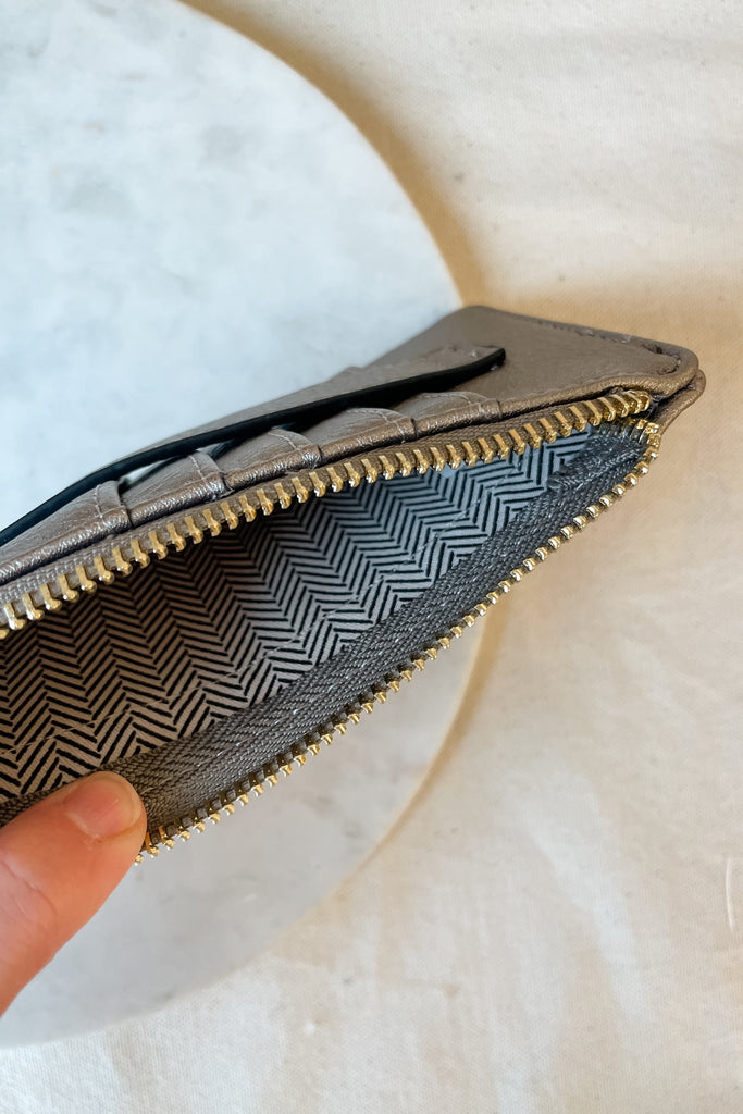 The Fay Slim Wallet with Snap Closure is so cute and convenient! They are slim, but have lots of compartments. You can easily store all of your cards, ID, receipts, and more. These are made with the softest vegan leather too.