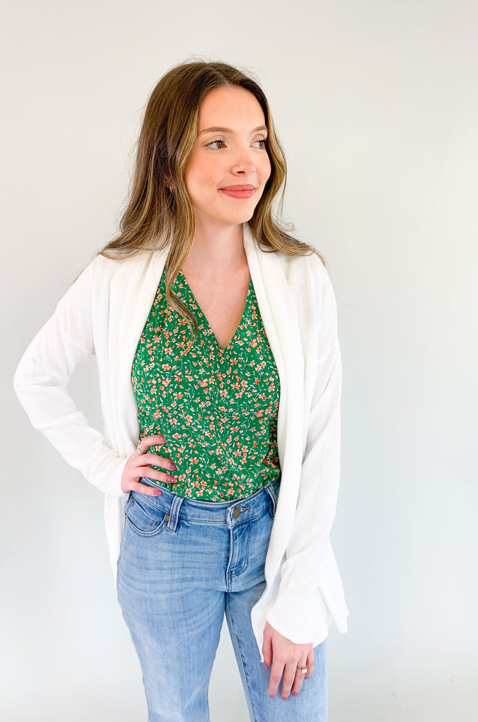 The Donna Draped Long Sleeve Cardigan is so soft and comes in two gorgeous colors.  These cardigans can be worn all year, so you will get a lot of wear out of them. Layering pieces are great for chillier days and make an outfit look more polished. They are also great for the office! If you love all things cute and cozy, this style is for you. 