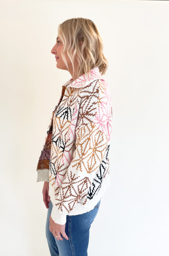 If you are looking for a unique statement piece, the Geometric Pattern Collared Cardigan is a winner! It has a trendy shape with an open front and defined collar. All over the cardigan is a unique brown, blush pink, and black geometric design. It  is a special style that looks chic and effortless. You can pair it over so many styles too, like our Joanie Tanks and Mae Tees.