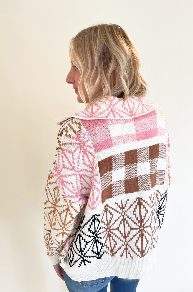 If you are looking for a unique statement piece, the Geometric Pattern Collared Cardigan is a winner! It has a trendy shape with an open front and defined collar. All over the cardigan is a unique brown, blush pink, and black geometric design. It  is a special style that looks chic and effortless. You can pair it over so many styles too, like our Joanie Tanks and Mae Tees.
