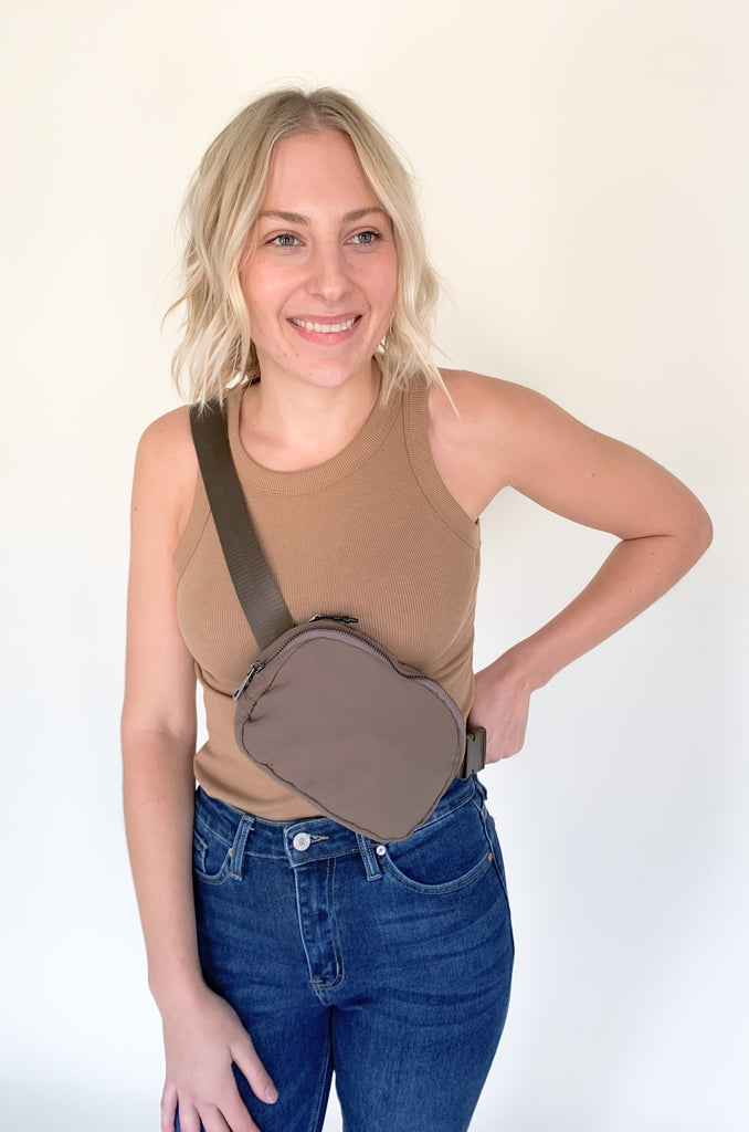 The Going Places Waterproof Belt Bag is a trendy dupe for a very popular style on the market, but for less! These are waterproof, easy to wear, and come in four amazing colors. Choose between caramel, camo black, light pink, and plum. They have an adjustable strap and inner compartments. 