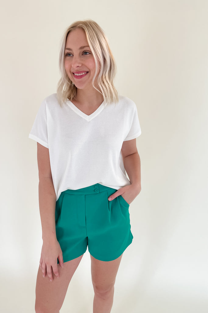 The Heidi Tailored Elastic Back Shorts are so fun! The pops of color are so trendy right now. Plus, the fabric is so elevated. It has an elastic waist band, pockets, a zipper fly, and pleats. It also has two buttons on the front. 