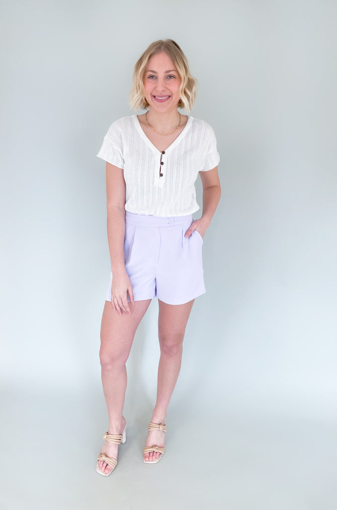 The Heidi Tailored Elastic Back Shorts are so fun! The pops of color are so trendy right now. Plus, the fabric is so elevated. It has an elastic waist band, pockets, a zipper fly, and pleats. It also has two buttons on the front. 