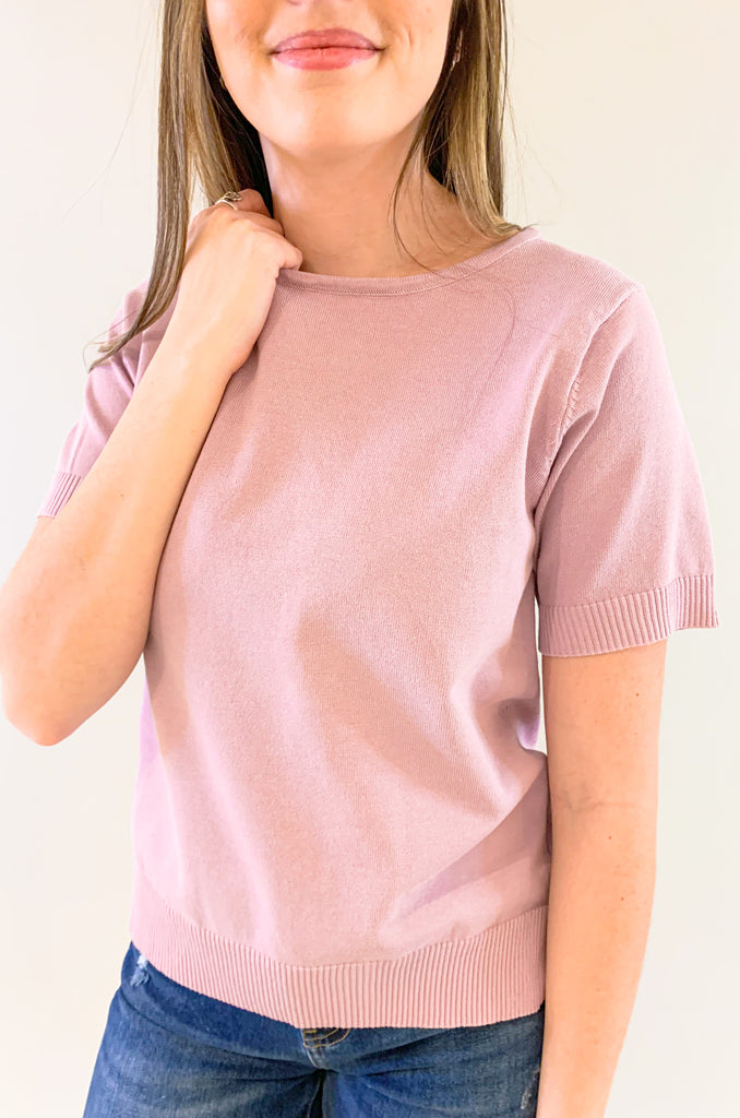 This cute elevated sweater is a must-have! It looks pretty and polished worn alone, but also great layered under jackets. This Hilary High Low Short Sleeve Sweater comes in two amazing colors, black and lilac. Both are perfect for spring. The fabric will keep you cozy on those early spring days too! 