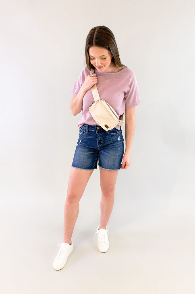 This cute elevated sweater is a must-have! It looks pretty and polished worn alone, but also great layered under jackets. This Hilary High Low Short Sleeve Sweater comes in two amazing colors, black and lilac. Both are perfect for spring. The fabric will keep you cozy on those early spring days too! 