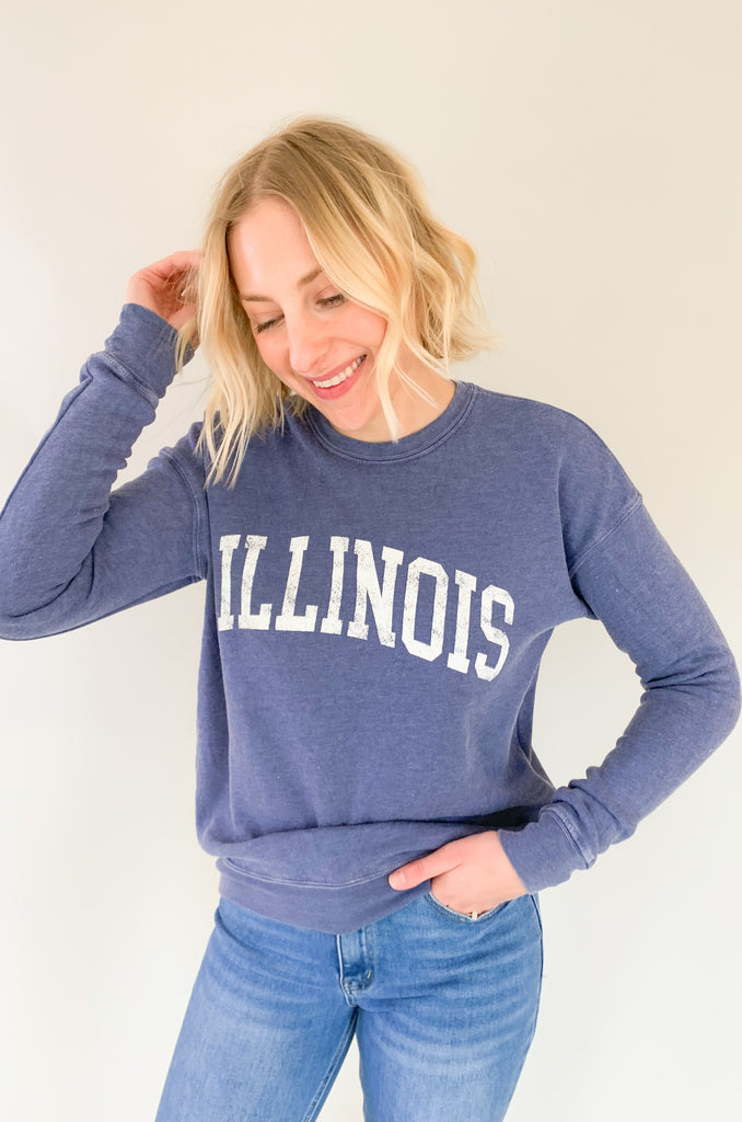 Illinois fans, get ready to fall in love with this dreamy ILLINOIS pullover! It is so soft and cozy, perfect for weekends, game days, class, you name it. We are loving the unique mineral washed effect too. It makes each pullover slightly unique with a vintage feel. Choose between to cute colors!