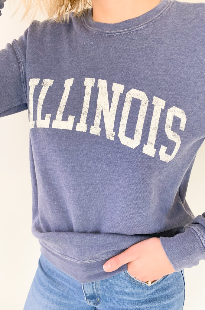 Illinois fans, get ready to fall in love with this dreamy ILLINOIS pullover! It is so soft and cozy, perfect for weekends, game days, class, you name it. We are loving the unique mineral washed effect too. It makes each pullover slightly unique with a vintage feel. Choose between to cute colors!