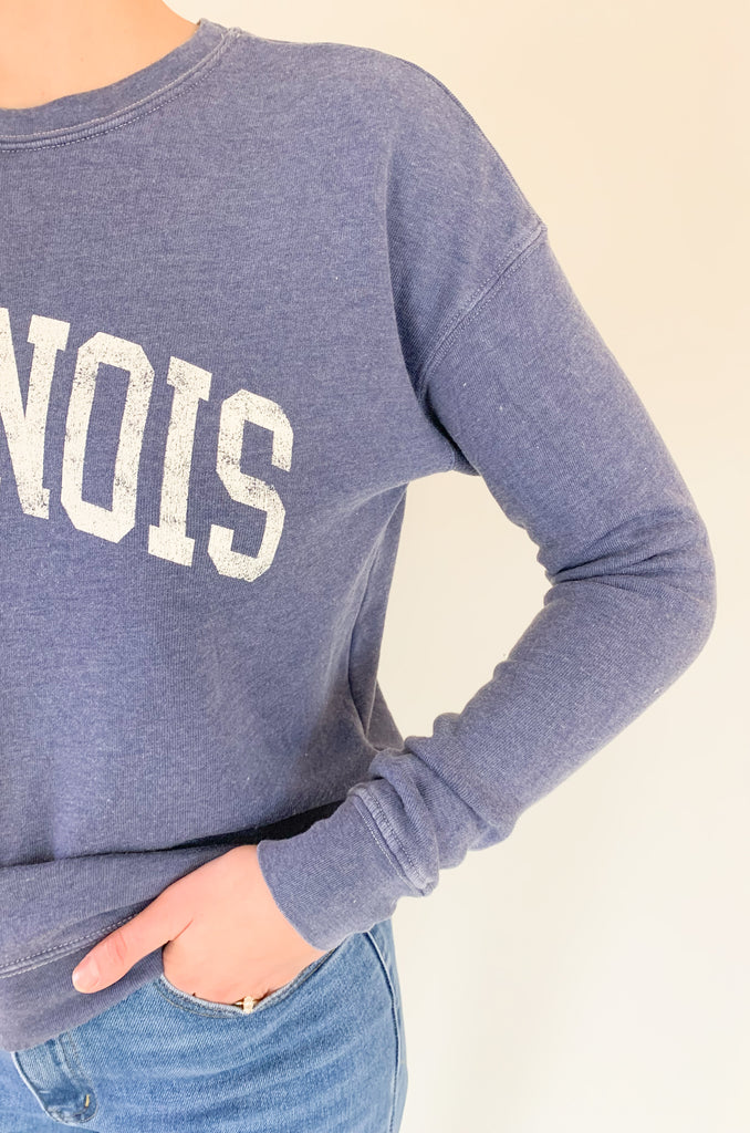 Illinois fans, get ready to fall in love with this dreamy ILLINOIS pullover! It is so soft and cozy, perfect for weekends, game days, class, you name it. We are loving the unique mineral washed effect too. It makes each pullover slightly unique with a vintage feel. Choose between to cute colors!
