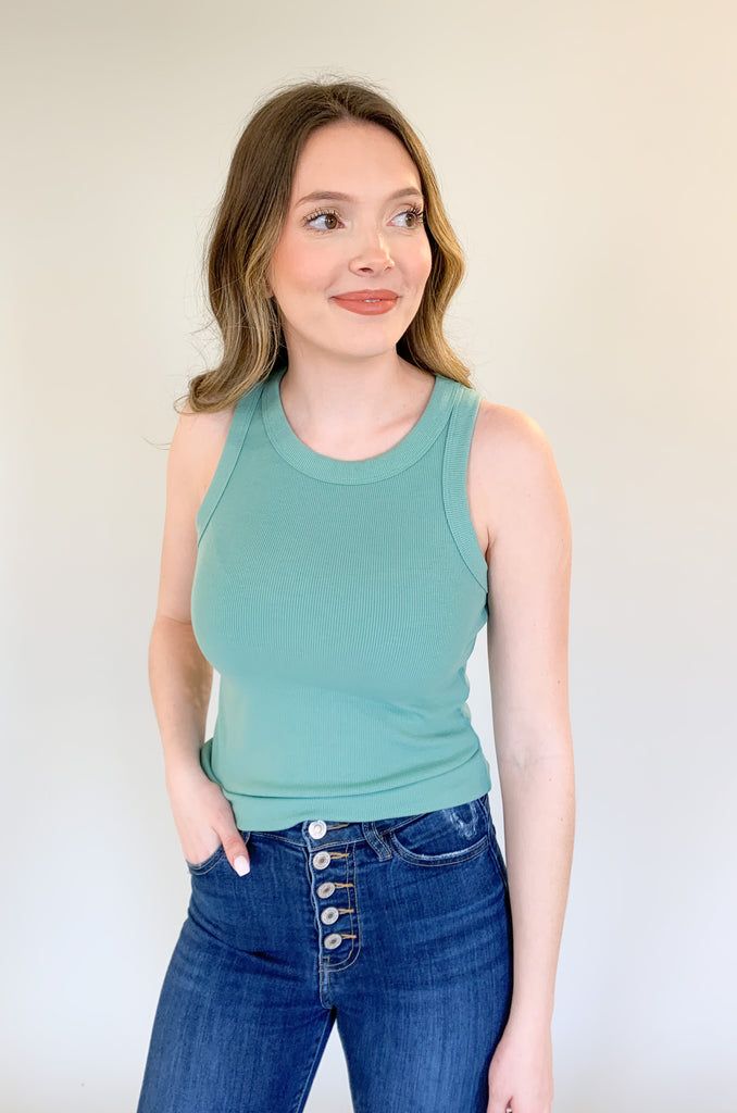 round neck fitted rib tank with plenty of stretch. Available in several colors, including green, sage, teal, black, ivory, brown, and oatmeal