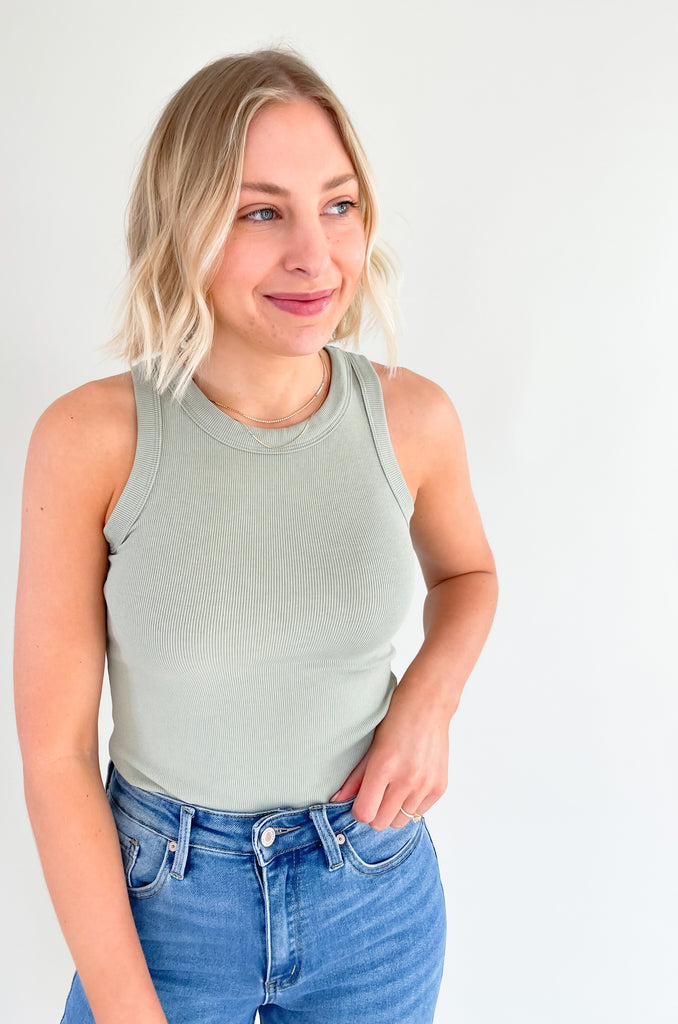 The Joanie Fitted Rib Tank is a style everyone needs! You can wear it all year and it looks so elevated. The neutral colors pair with everything too. This ribbed tank has a round neckline and a great fit. It's comfortable, chic, and an amazing everyday basic. 