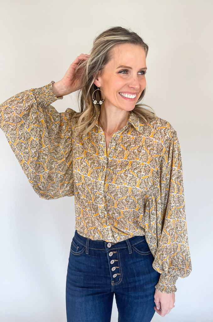 The Jolene Boho Blouse is absolutely gorgeous! It has a unique abstract floral design that resembles hearts. Throughout the blouse, there are stripes of lurex. This adds a shimmery detail that looks so elevated. 