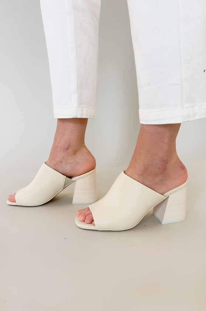 The Kathleen Block Heel Slides is chic, trendy, and perfect for spring! This style is very comfortable with cushioned padding. It is the perfect shoe to elevate your outfit. The block heel is very easy to wear too. You can style these shoes with wide leg denim, dresses, or skirts- the options are endless!