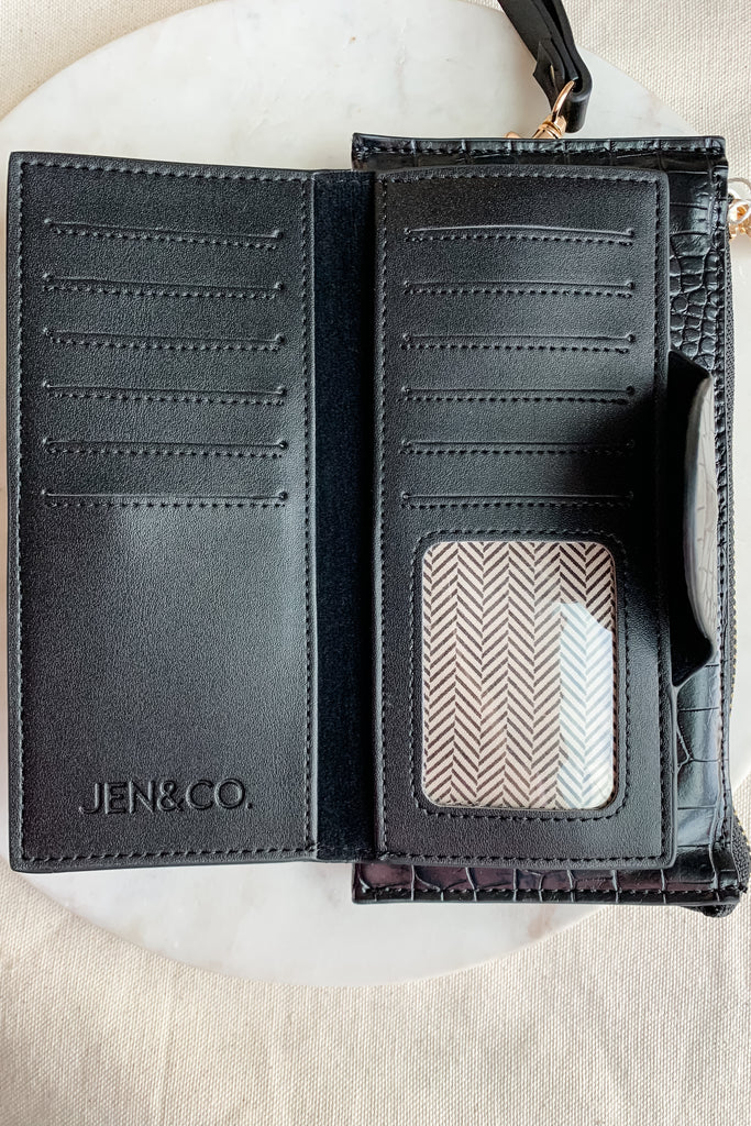 The Kyla Wristlet Strap Wallet is so chic and easy to take anywhere! It is big enough to carry everything you need and has a wristlet band for on the go.  The Kyla Wallet is Vegan Leather and very durable. We love it! Choose between several colors to go with any of our new handbags.
