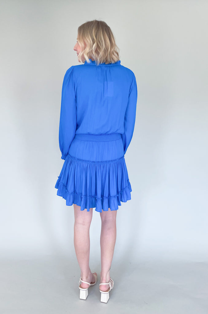 The Long Sleeve Ruffle Party Dress is a "WOW" piece! That bright cobalt blue color makes a statement, along with the other stunning details on this dress. The fabric is silky and elevated. It has long sleeves that helps balance the above the knee length. With the tiered shape, it gives a flattering flounce too. This style is a go-to for special events!