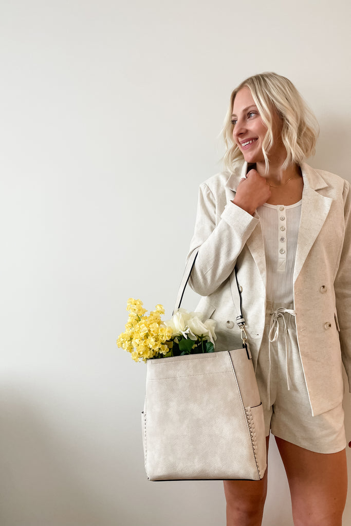 The Penny 2 in 1 Hobo Braided Handbag is so pretty and practical. It is big enough to hold all of your belongings, and keeps them organized. It has multiple pockets, and an extra matching pouch that you can keep in the bag, or take out.