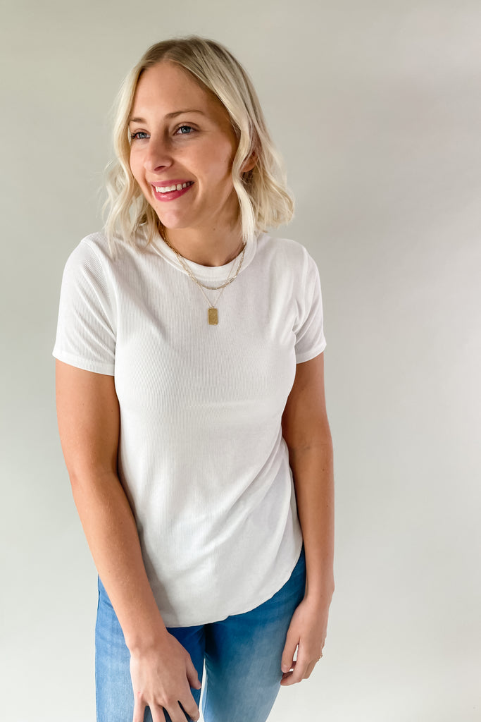 The Mae Short Sleeve Ribbed Tee is an amazing basic to have. It is better than an average shirt and has subtle details we love. The top has a ribbed fabric, which smooths the body and looks so chic. It comes in a few colors and pairs with everything too!
