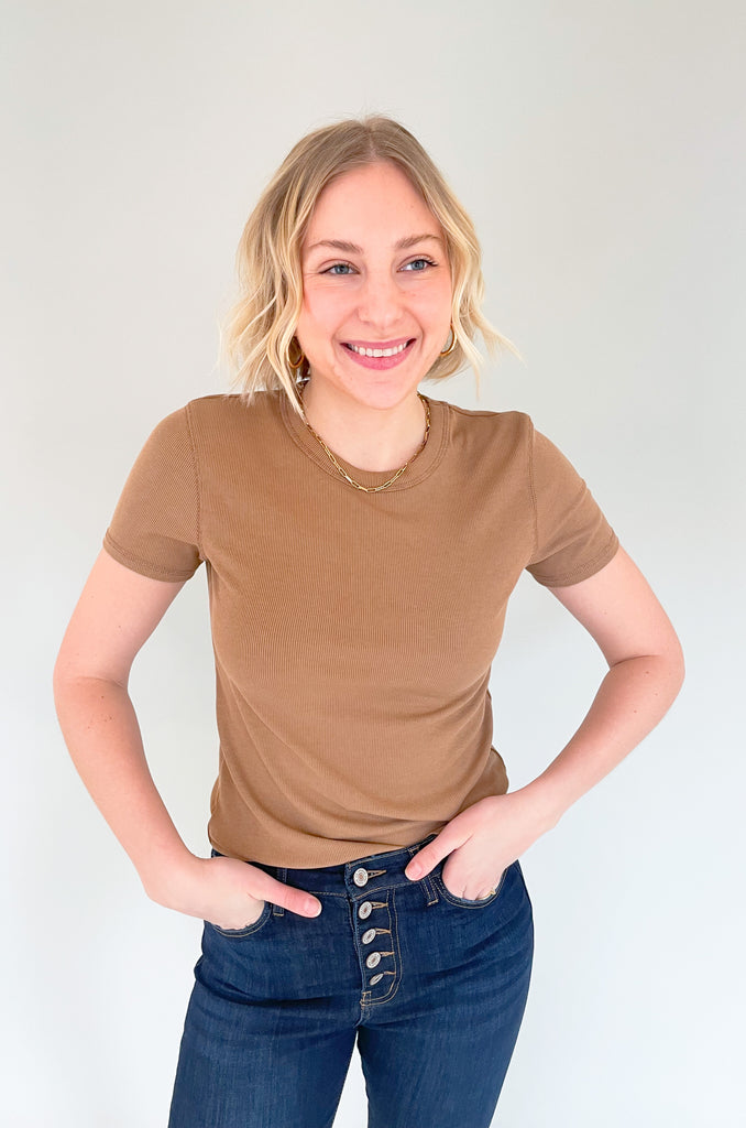 The Mae Short Sleeve Ribbed Tee is an amazing basic to have and a BESTSELLER!  It is better than an average shirt and has subtle details we love. The top has a ribbed fabric, which smooths the body and looks so chic. It comes in a few colors and pairs with everything too!