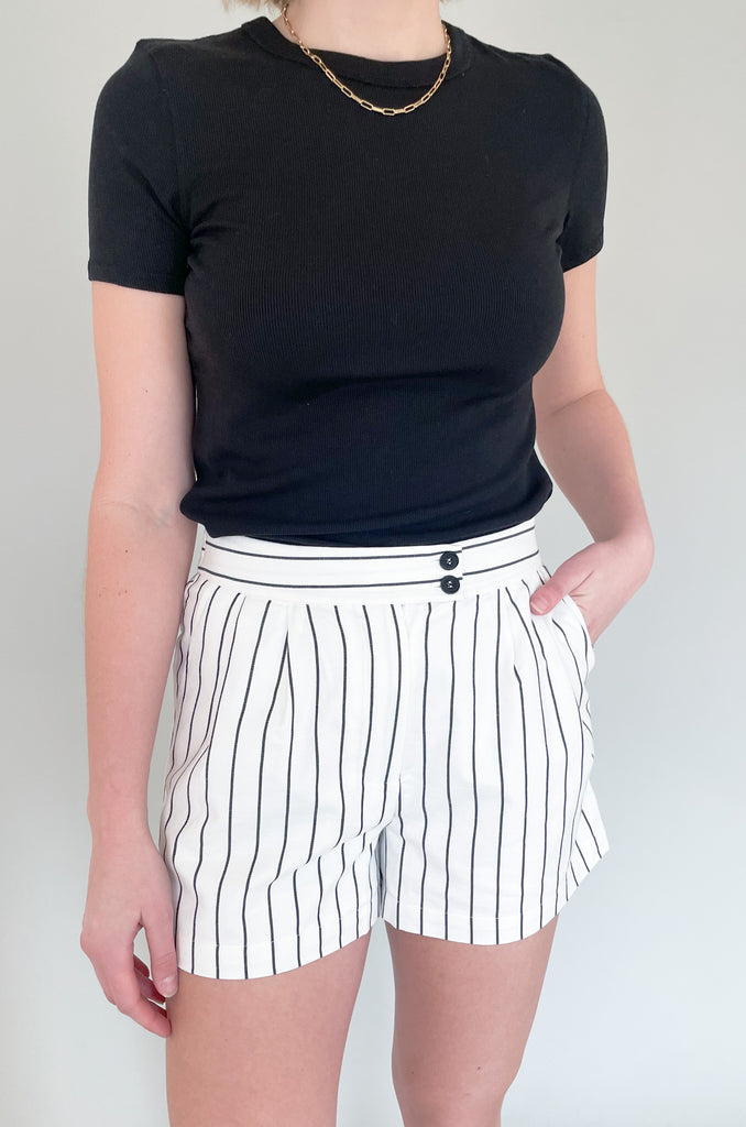 The Mae Short Sleeve Ribbed Tee is an amazing basic to have and a BESTSELLER!  It is better than an average shirt and has subtle details we love. The top has a ribbed fabric, which smooths the body and looks so chic. It comes in a few colors and pairs with everything too!